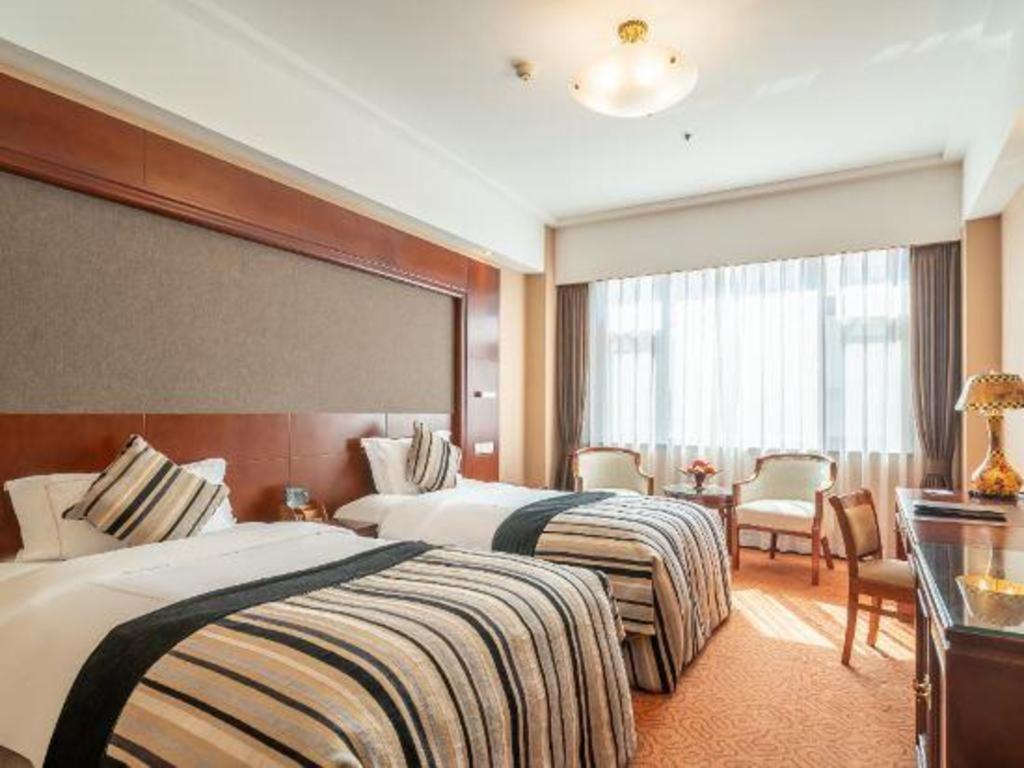 Yantai Golden Gulf Hotel Exterior foto